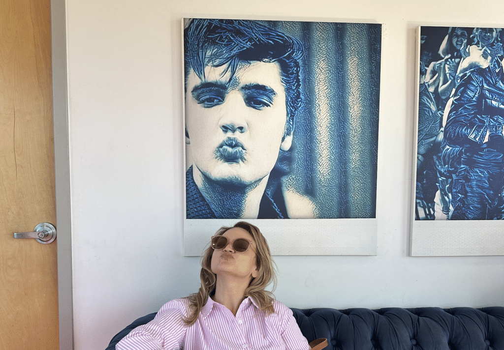 Angie Orth with image of Elvis in Tupelo at Strange Brew